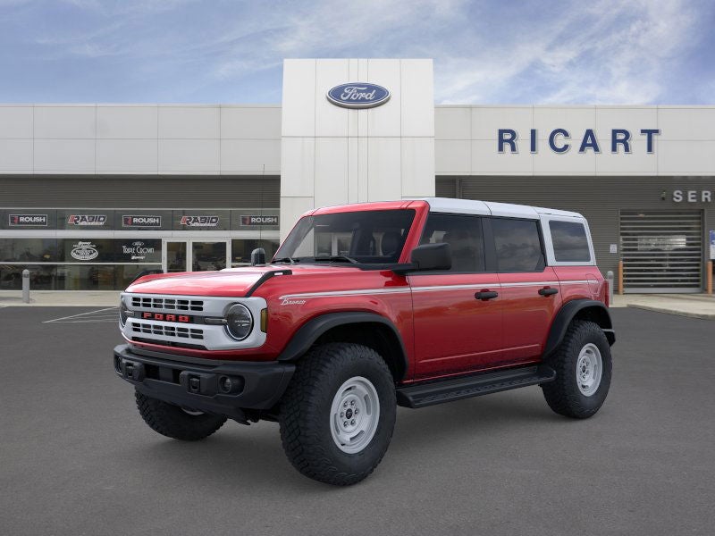 2025 Ford Bronco Heritage Edition in Ruby Red Metallic Tinted Clearcoat — front three-quarter view
