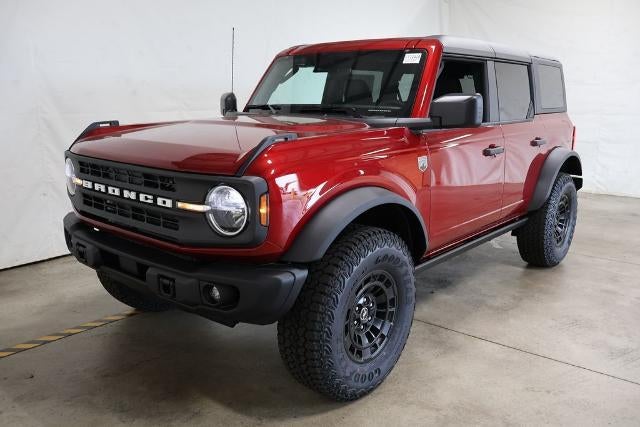 2026 Ford Bronco Big Bend in Ruby Red Metallic Tinted Clearcoat — front three-quarter view