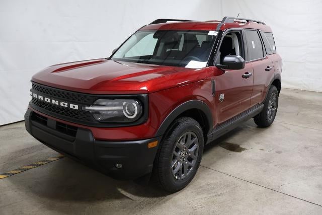 2026 Ford Bronco Sport Big Bend Demo in Ruby Red Metallic Tinted Clearcoat — front three-quarter view
