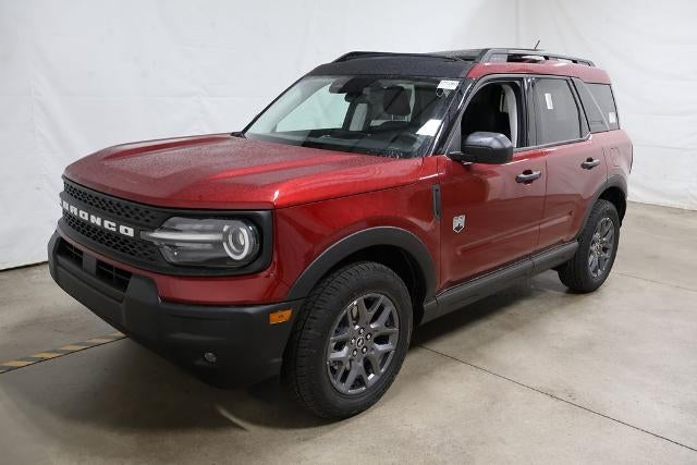 2026 Ford Bronco Sport Big Bend Demo in Ruby Red Metallic Tinted Clearcoat — front three-quarter view