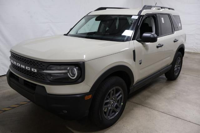 2025 Ford Bronco Sport Big Bend Demo in Desert Sand — front three-quarter view