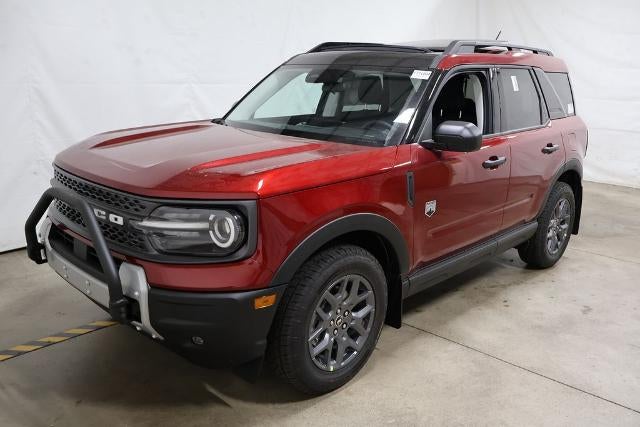 2026 Ford Bronco Sport Big Bend Demo in Ruby Red Metallic Tinted Clearcoat — front three-quarter view