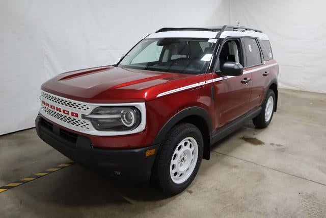 2026 Ford Bronco Sport Heritage Demo in Ruby Red Metallic Tinted Clearcoat — front three-quarter view