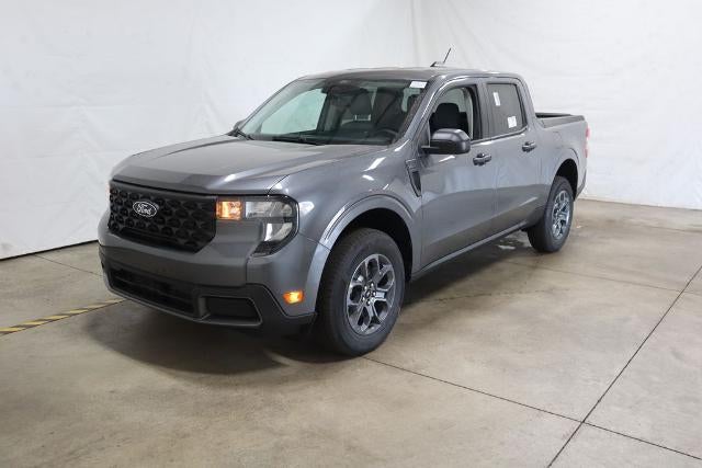 2026 Ford Maverick XLT Demo in Carbonized Gray Metallic — front three-quarter view