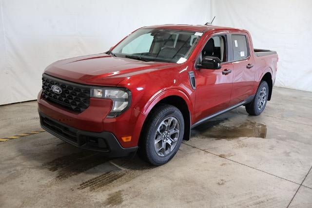 2026 Ford Maverick XLT in Ruby Red Metallic Tinted Clearcoat — front three-quarter view