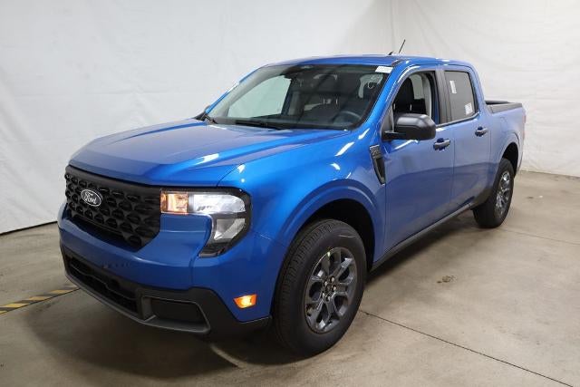 2026 Ford Maverick XLT Demo in Velocity Blue — front three-quarter view