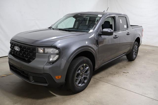 2026 Ford Maverick XLT Demo in Carbonized Gray Metallic — front three-quarter view
