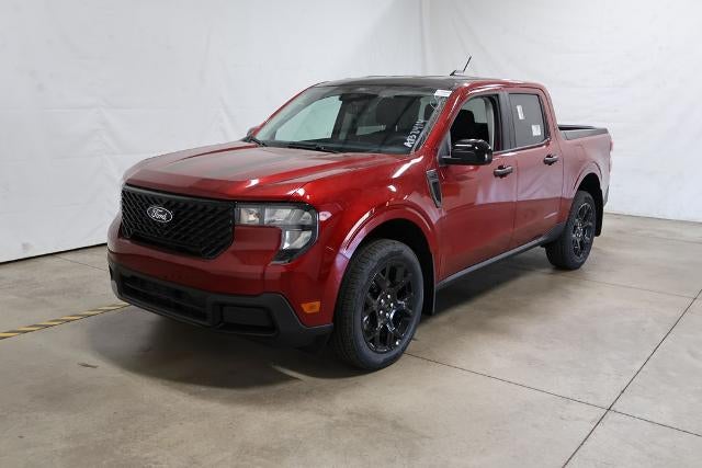 2026 Ford Maverick XLT in Ruby Red Metallic Tinted Clearcoat — front three-quarter view