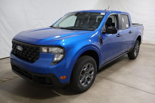2026 Ford Maverick XLT Demo in Blue — front three-quarter view