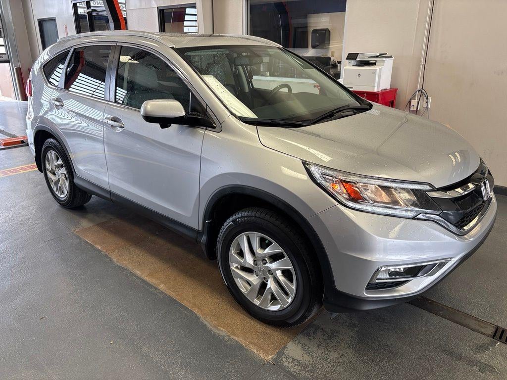 2016 Honda CR-V EX-L in Alabaster Silver Metallic — front three-quarter view