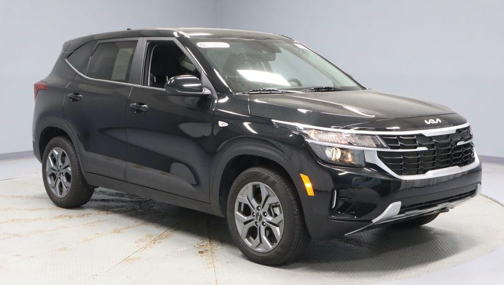 2024 Kia Seltos LX in Fusion Black — front three-quarter view