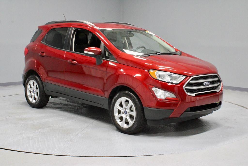 2021 Ford EcoSport SE in Ruby Red Metallic Tinted Clearcoat — front three-quarter view