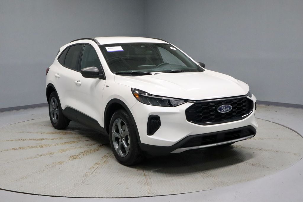 2025 Ford Escape ST-Line AWD in Star White Metallic Tri Coat — front three-quarter view