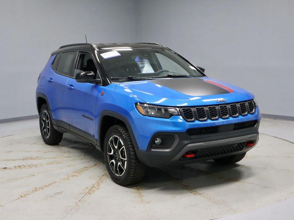 2025 Jeep Compass Trailhawk 4x4 in Hydro Blue Pearlcoat — front three-quarter view