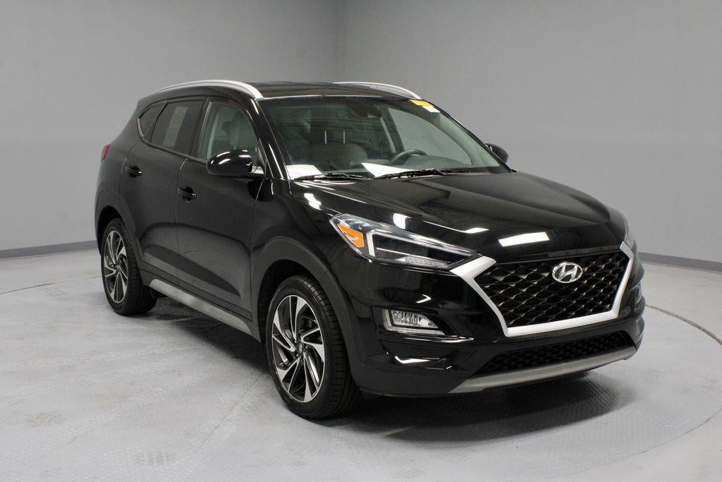 2021 Hyundai TUCSON Sport AWD in Black Noir Pearl — front three-quarter view