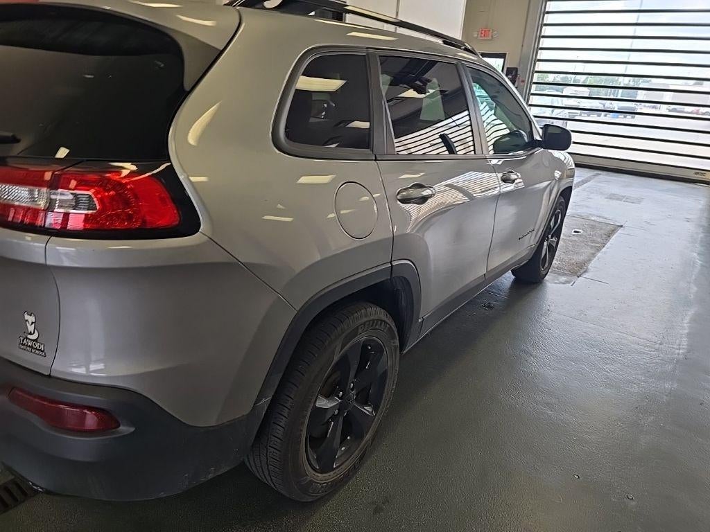 2016 Jeep Cherokee — rear three-quarter view