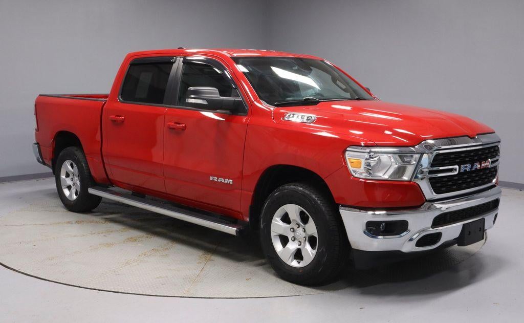 2022 RAM 1500 Big Horn/Lone Star in Flame Red Clearcoat — front three-quarter view