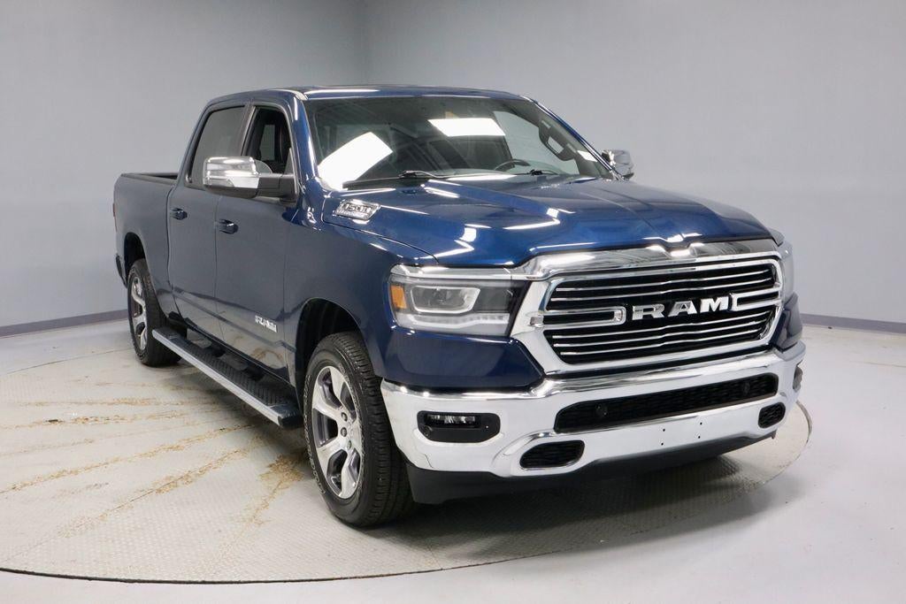 2023 RAM 1500 Laramie in Patriot Blue Pearlcoat — front three-quarter view