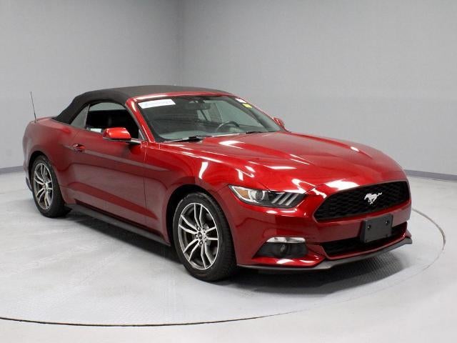 2016 Ford Mustang EcoBoost Premium in Ruby Red Metallic Tinted Clearcoat — front three-quarter view