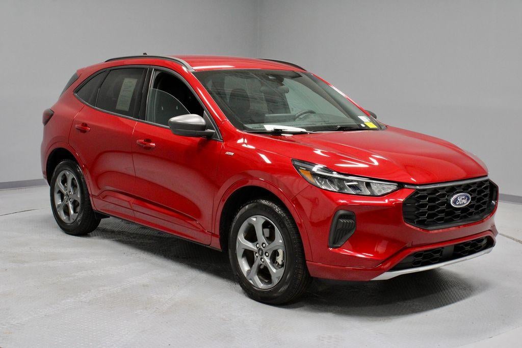 2024 Ford Escape ST-Line in Rapid Red Metallic Tinted Clearcoat — front three-quarter view