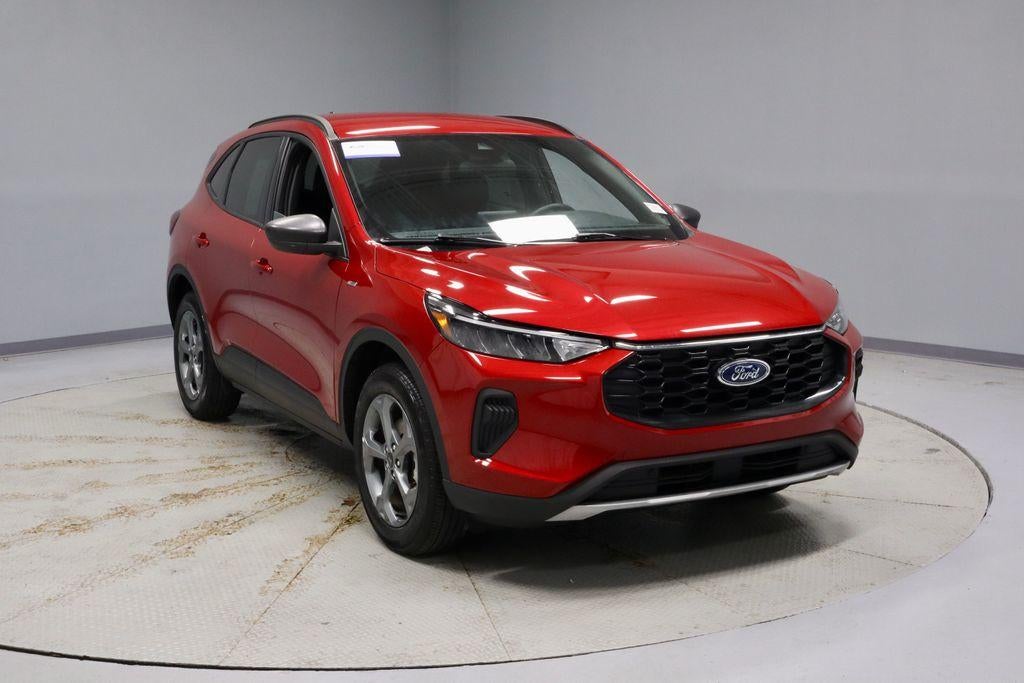 2025 Ford Escape ST-Line in Rapid Red Metallic Tinted Clearcoat — front three-quarter view