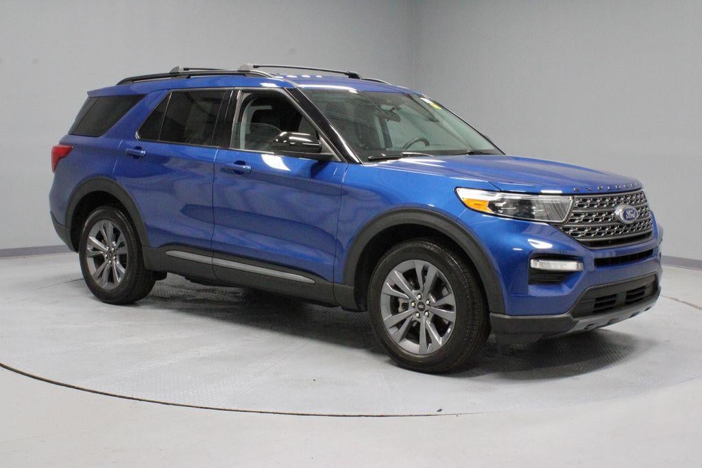 2023 Ford Explorer XLT in Atlas Blue Metallic — front three-quarter view