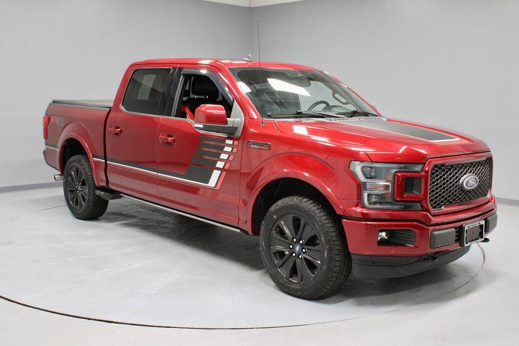 2019 Ford F-150 Lariat in Ruby Red Metallic Tinted Clearcoat — front three-quarter view