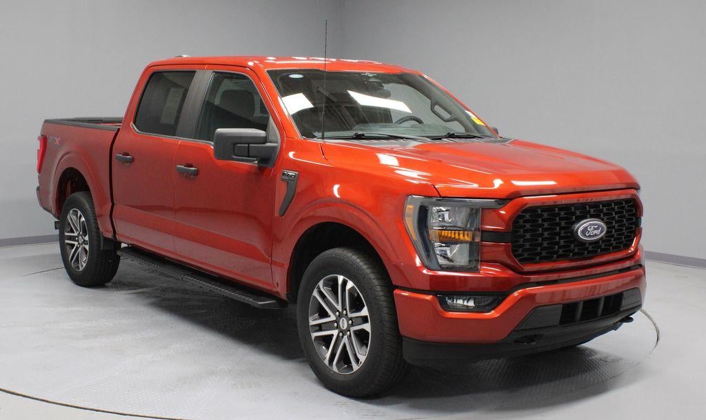 2023 Ford F-150 XL in Hot Pepper Red Metallic Tinted Clearcoat — front three-quarter view