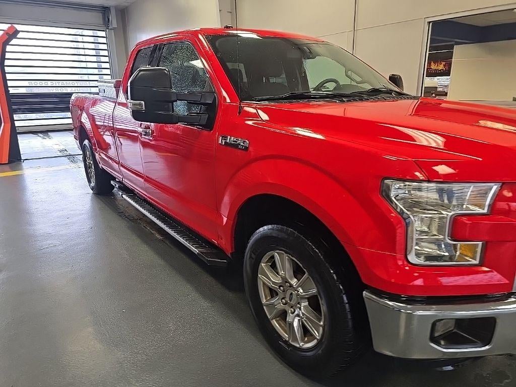 2016 Ford F-150 XLT in Race Red — front three-quarter view