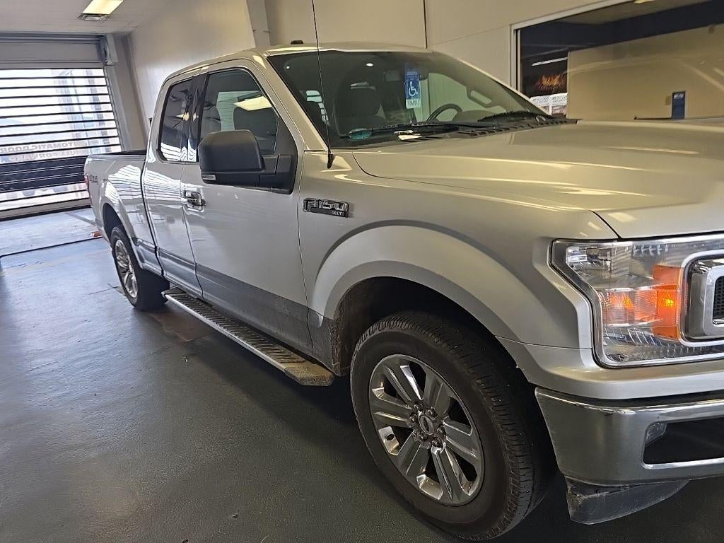 2018 Ford F-150 XLT in Ingot Silver Metallic — front three-quarter view