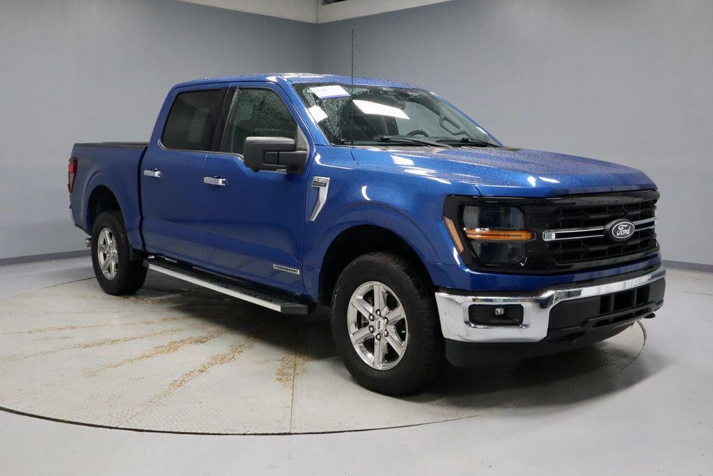 2024 Ford F-150 XLT in Atlas Blue Metallic — front three-quarter view