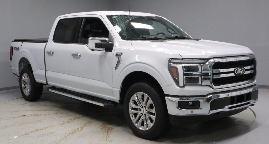 2025 Ford F-150 Lariat in Space White Metallic — front three-quarter view
