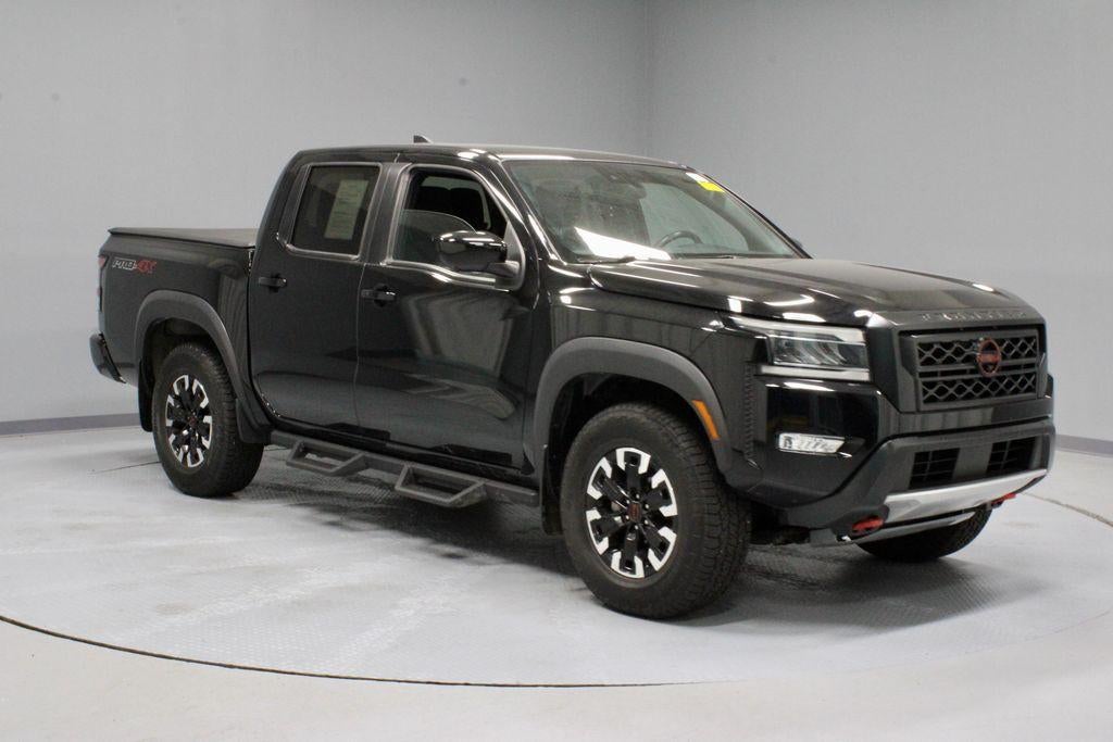2023 Nissan Frontier PRO-4X in Black — front three-quarter view