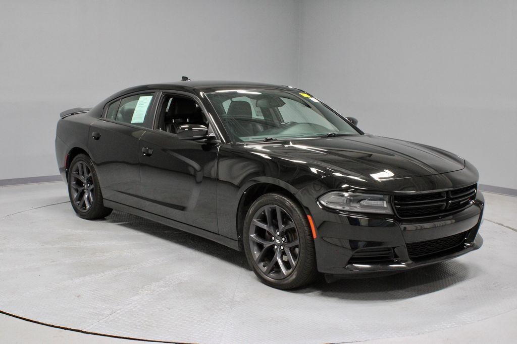 2020 Dodge Charger SXT in Pitch Black Clearcoat — front three-quarter view