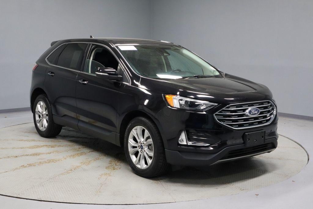 2024 Ford Edge Titanium in Agate Black Metallic — front three-quarter view