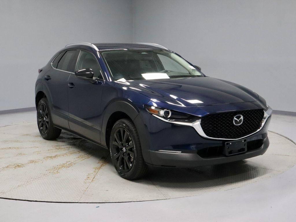 2024 Mazda Mazda CX-30 2.5 S Select Sport in Deep Crystal Blue Mica — front three-quarter view