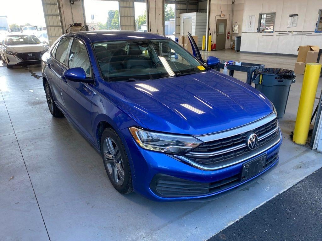 2024 Volkswagen Jetta 1.5T SE in Rising Blue Metallic — front three-quarter view