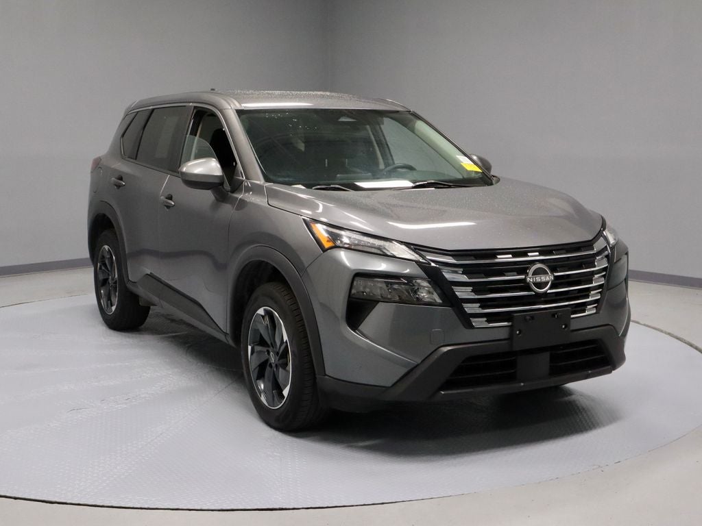 2024 Nissan Rogue SV in Gun Metallic — front three-quarter view
