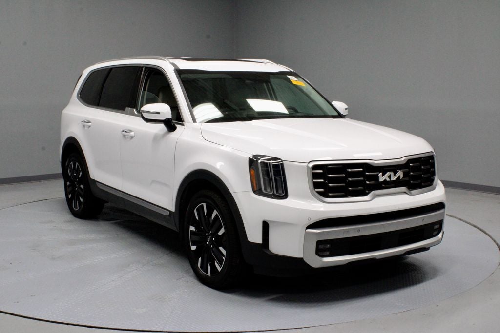 2024 Kia Telluride SX-Prestige in Glacial White Pearl — front three-quarter view