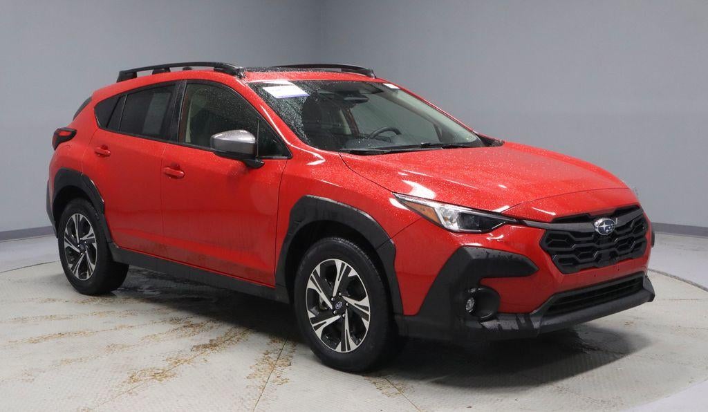 2025 Subaru Crosstrek Premium in Pure Red — front three-quarter view