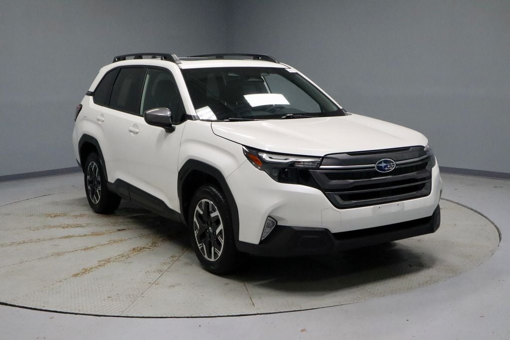 2025 Subaru Forester Premium in Crystal White Pearl — front three-quarter view