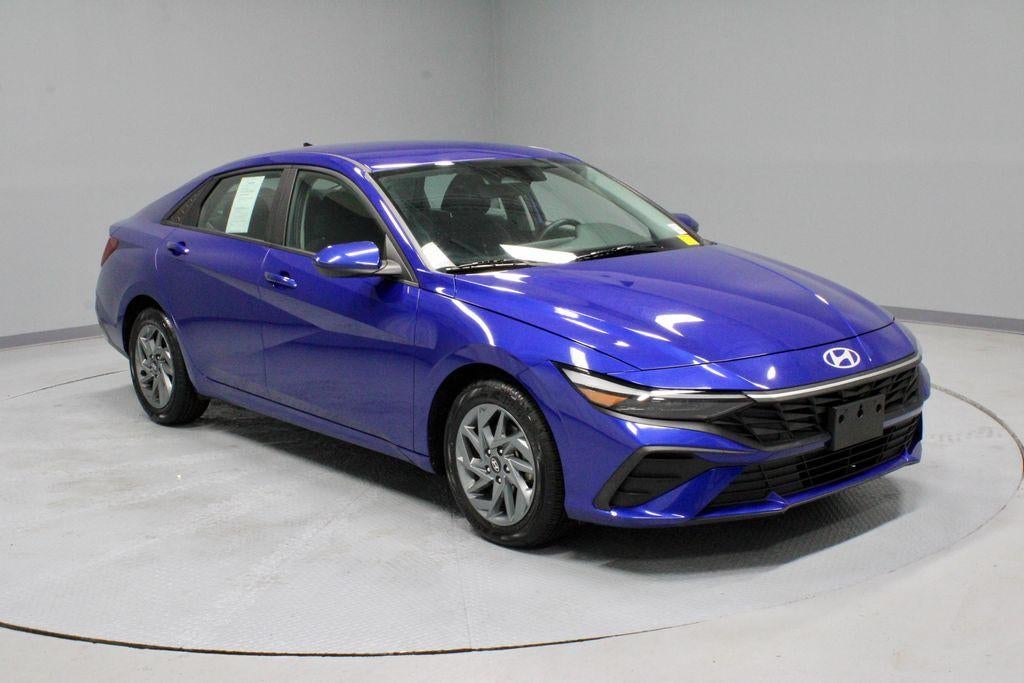 2024 Hyundai ELANTRA SEL in Intense Blue — front three-quarter view