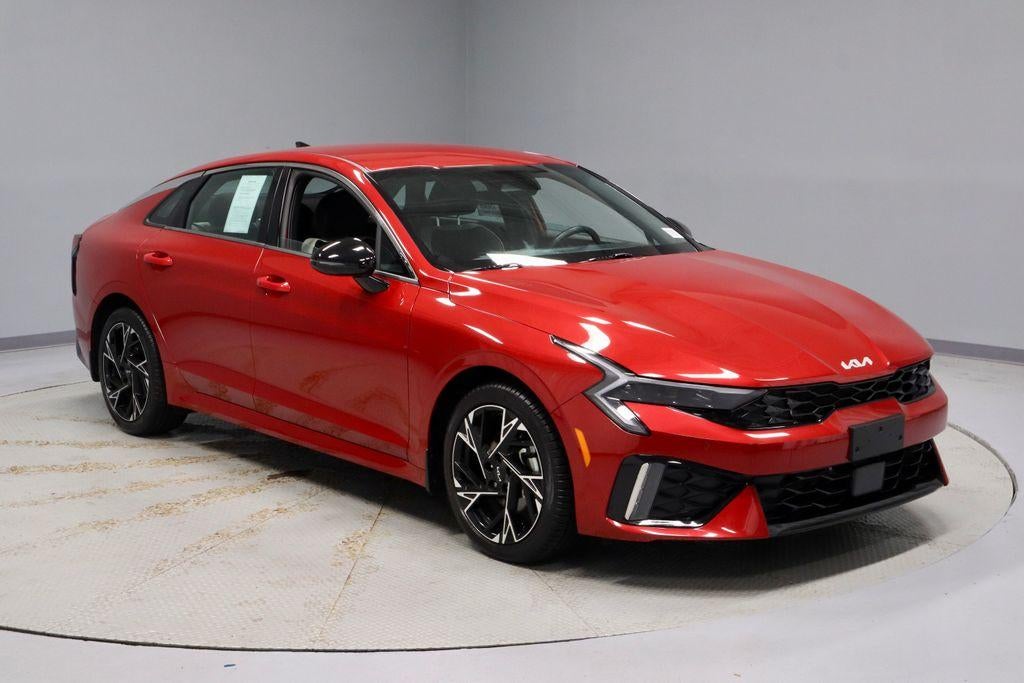 2025 Kia K5 GT-Line in Runway Red — front three-quarter view