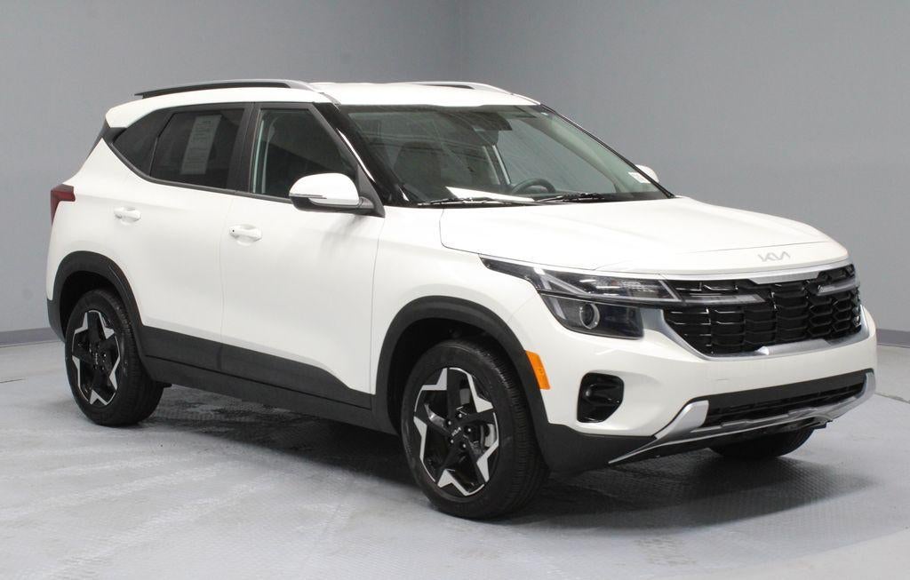 2025 Kia Seltos S in Snow White Pearl — front three-quarter view